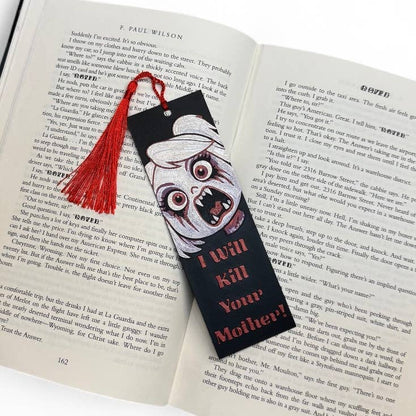 Bookmark with a cartoon character and text on an open book