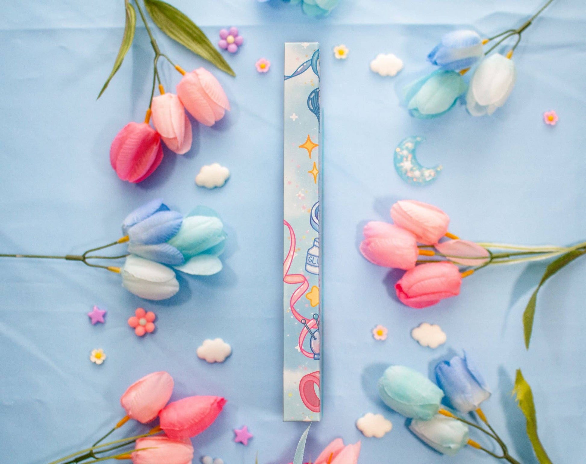 Colorful tulips on a blue background with decorative elements