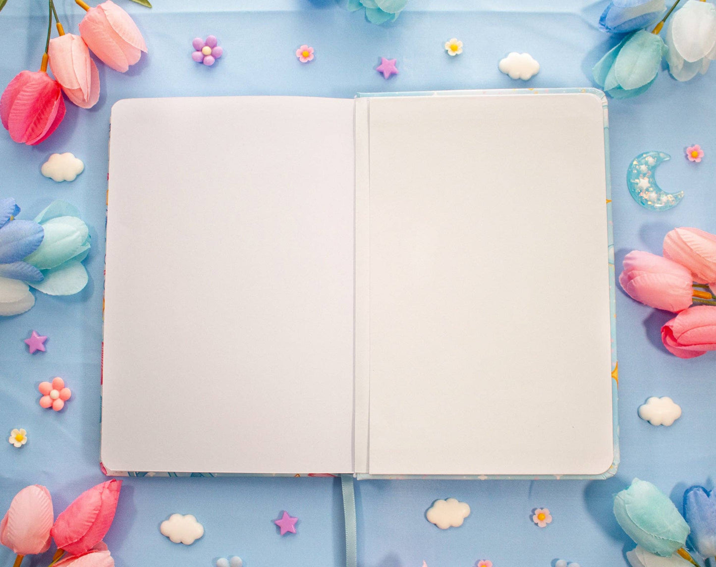 Open notebook on a blue background 
